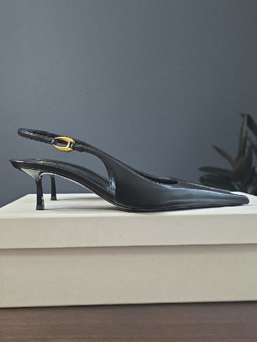 Saint Laurent Black Leather Pointed Slingback Pumps with Gold Accents - Picture 4 of 16